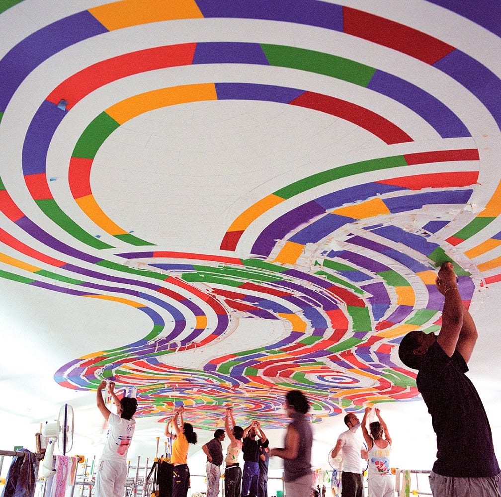 Sol LeWitt, Whirls and Twirls 1, (during the execution of the wall drawing), Biblioteca Panizzi, Reggio Emilia, 2004 [© The Estate of Sol LeWitt]