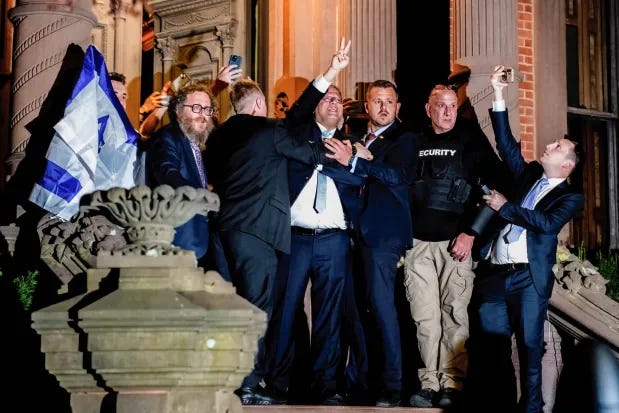 Convicted Terrorist Itamar Ben-Gvir outside Chabad headquarters, provoking and inflaming confrontation against protesters opposing his presence. Convicted Terrorist Itamar Ben-Gvir outside Chabad headquarters, provoking and inflaming confrontation against protesters opposing his presence.