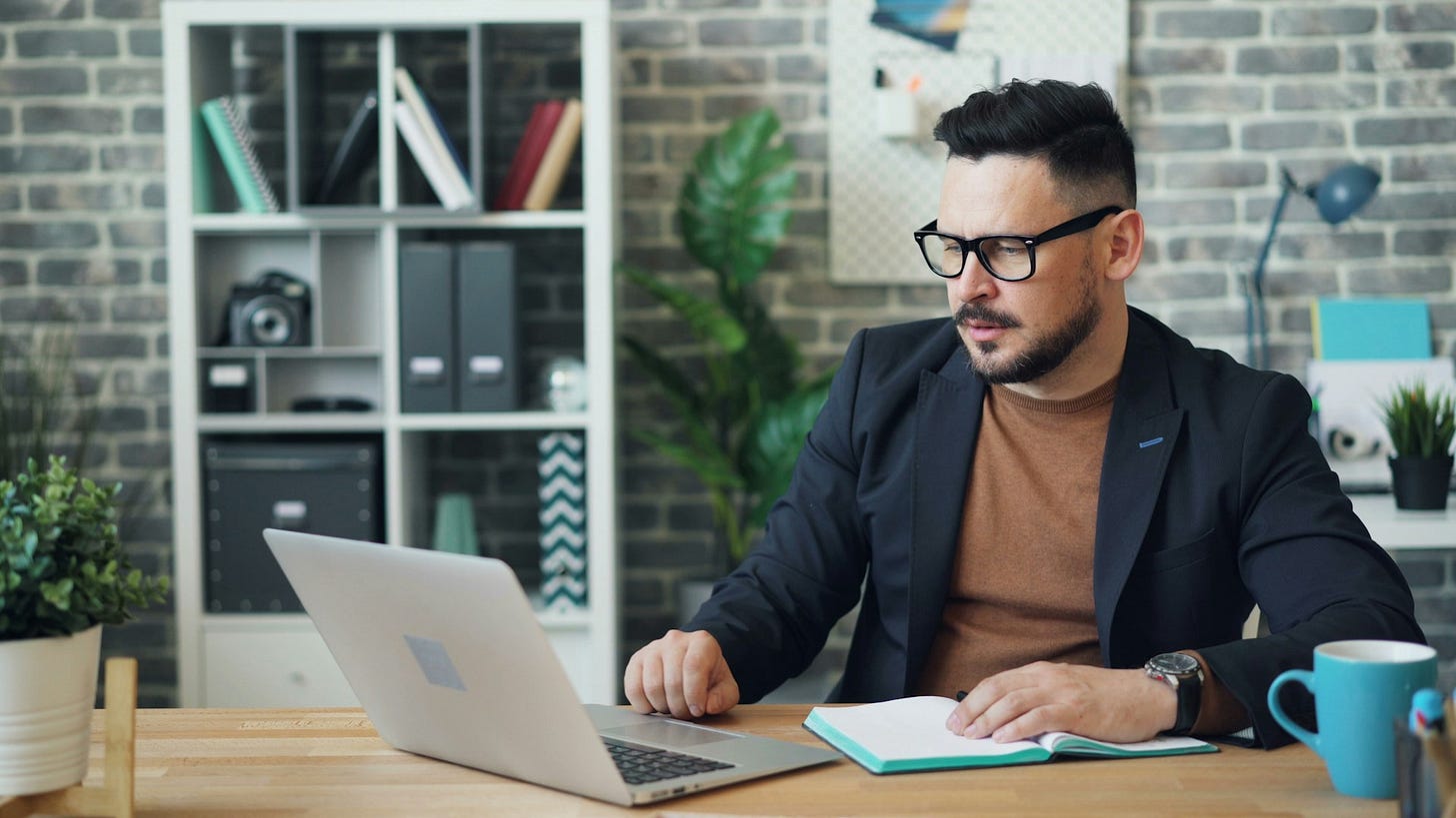 Man at a desk looking at a laptop. Photo by Vitaly Gariev on Unsplash Man at a desk looking at a laptop. Photo by Vitaly Gariev on Unsplash