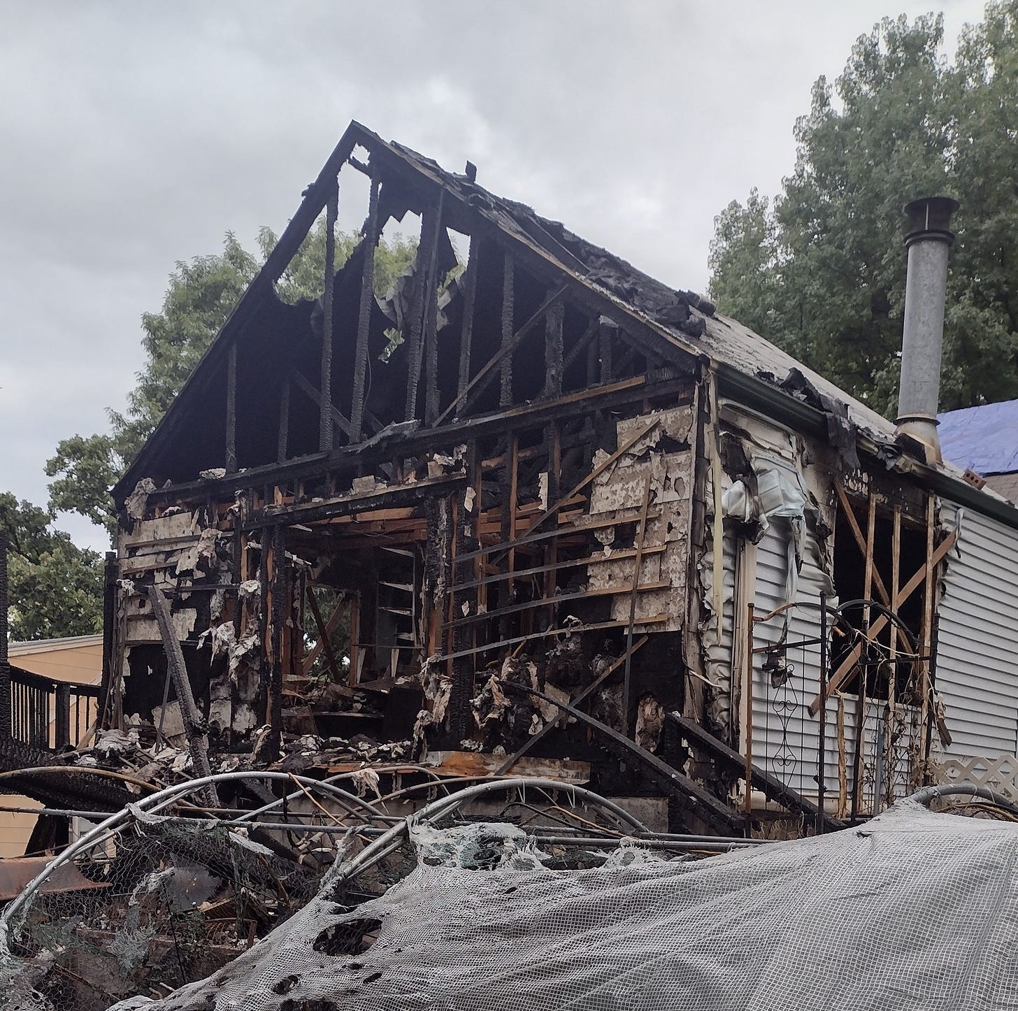 Back view of our house, with top of greenhouse.