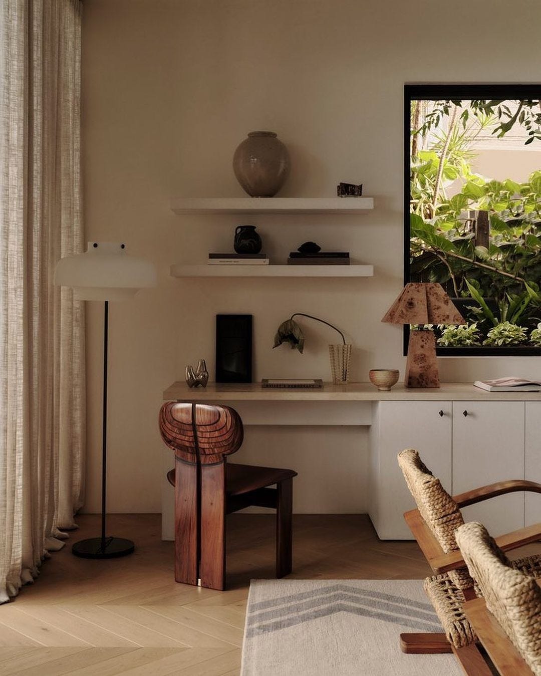 calming home office zone with greenery and washed walls creating a peaceful zone