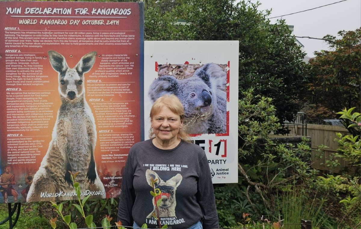Jo Tibbitts next to the Yuin Declaration For Kangaroos