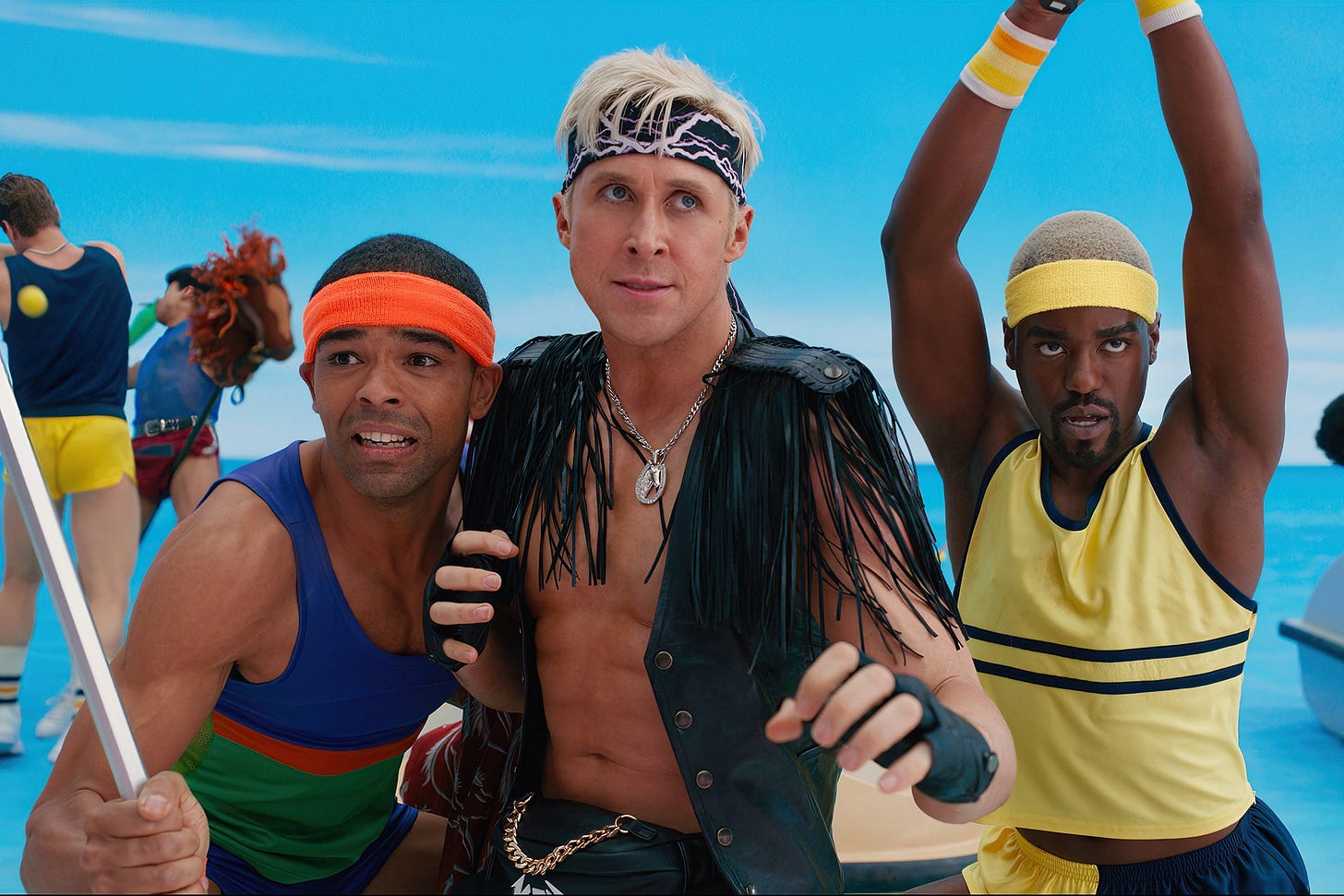 Ryan Gosling's Ken in the centre of a phalanx of other Kens preparing for battle