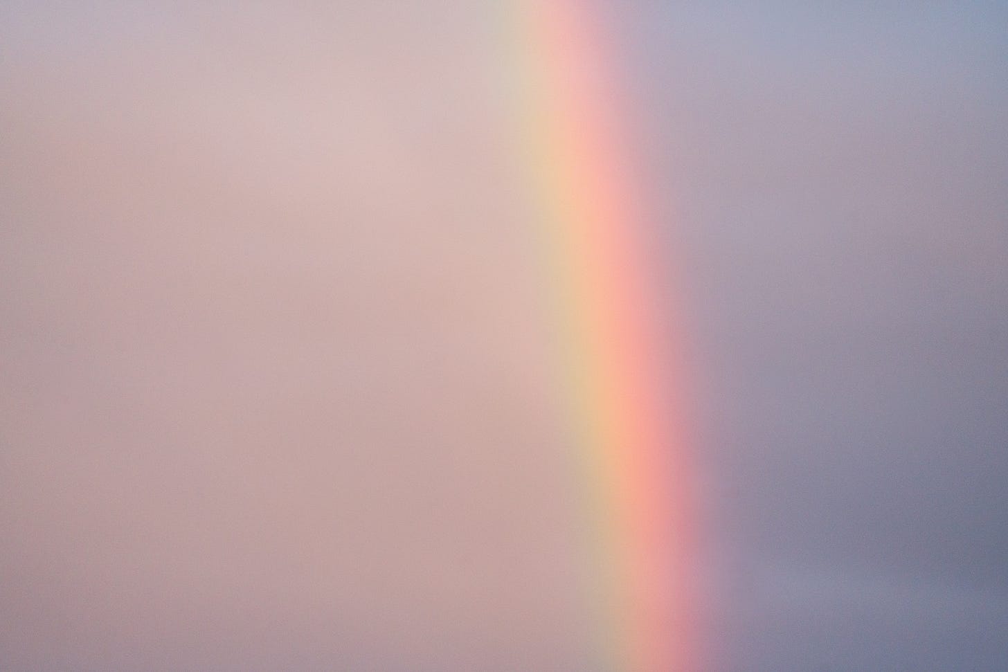 Rainbow on cloudless sky in nature Rainbow on cloudless sky in nature
