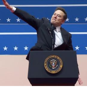 A person standing on a podium with his arm raised
AI-generated content may be incorrect.