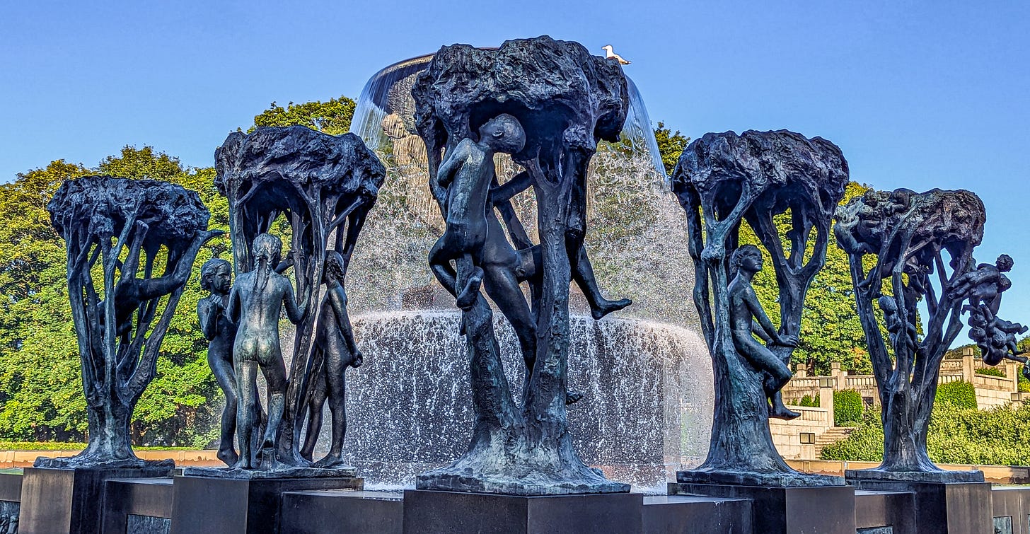 The trees around the Fountain, each one filled with babies or children. 