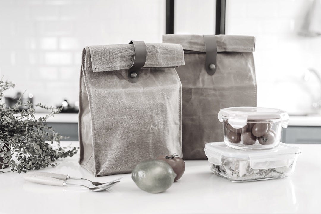 a couple of bags sitting on top of a table