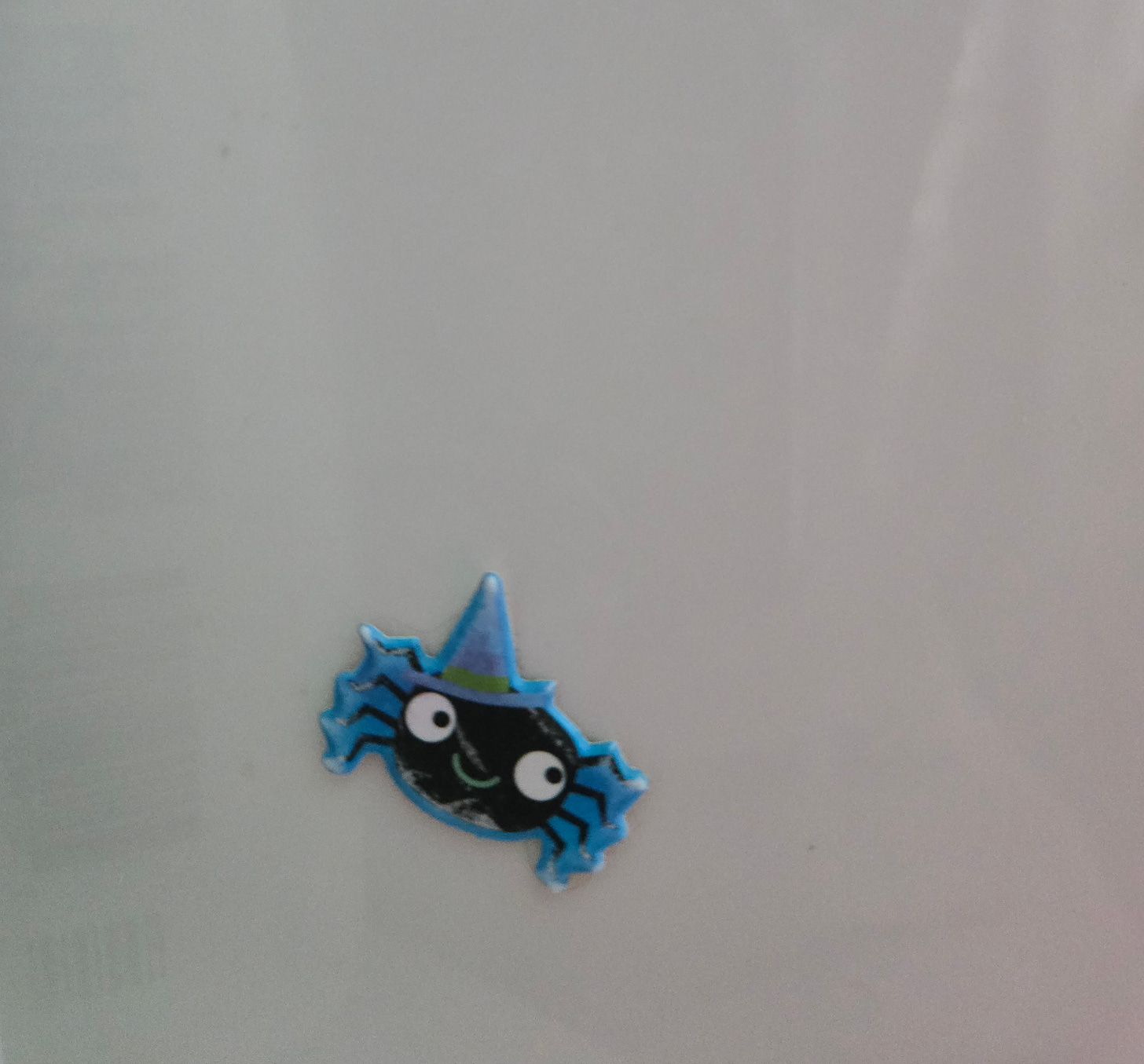 halloween spider sticker stuck to shower wall