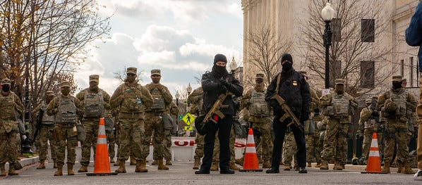 Members of the National Guard and U.S. Capitol Police guard the U.S. Supreme Court during Biden-Haris Inauguration Members of the National Guard and U.S. Capitol Police guard the U.S. Supreme Court during Biden-Haris Inauguration