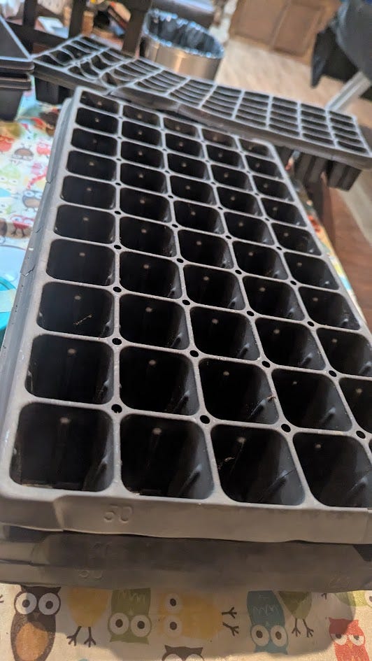 4 images of a seedling flat, the tray to go under it, soil in the flat, and a pencil poking a hole in one cell of the flat.