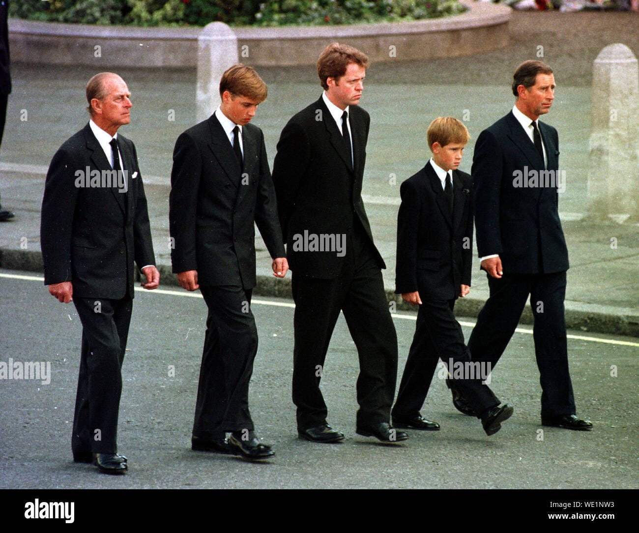 Princess Diana's funeral, Prince Harry extremely short and small compared to all his relatives. because he was twelve.