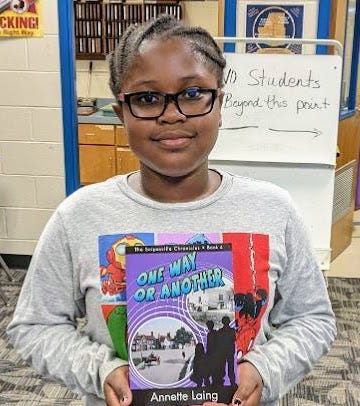 Kids holding books