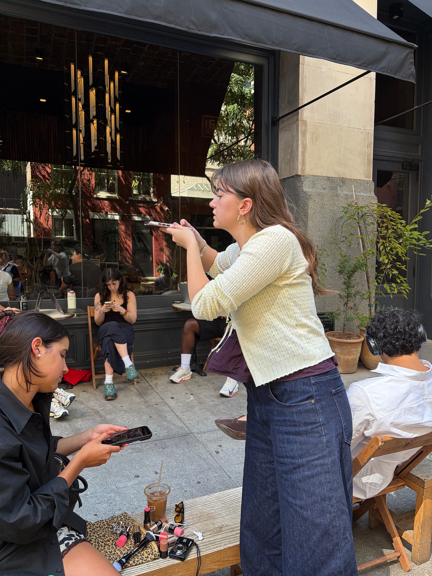 Anya capturing photos of e.l.f. products for creative.