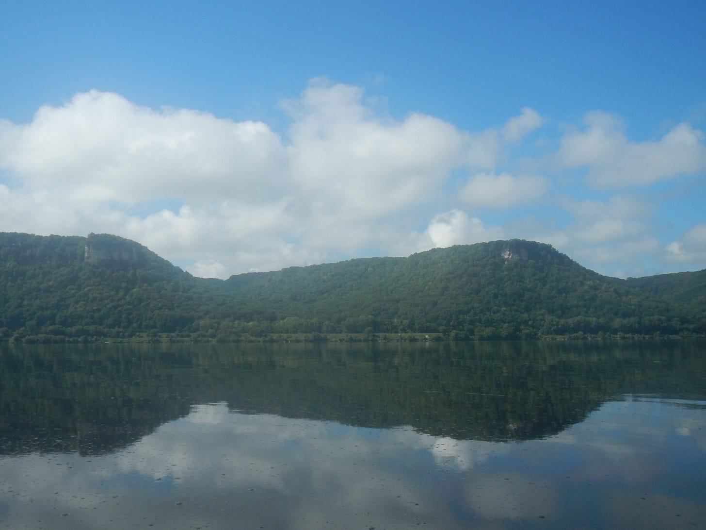 Many hours later, the fog burns off to reveal...More. Lake.