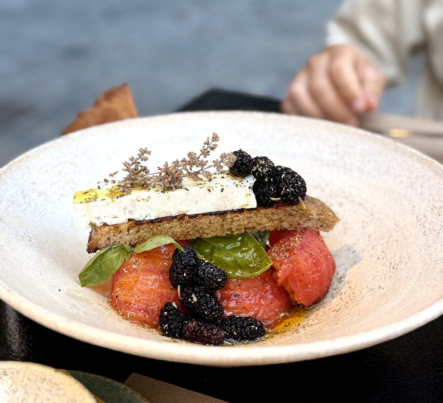 Goat cheese, tomatoes and blackberry plate from Sintrofi, Thessaloniki
