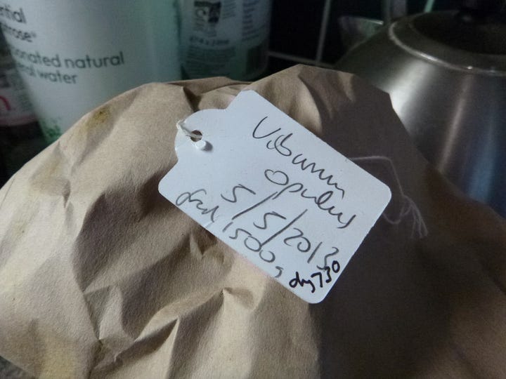 Several images of tags as labels on bags of dried herbs