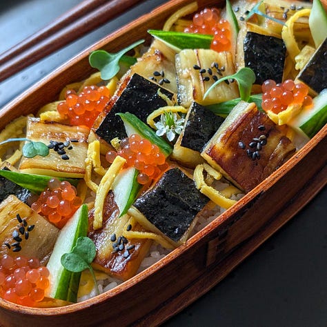 Eggplant unagi three ways: sushi rolls with avocado and torched topping, a modern sushi bowl with vegetables and plant-based egg, and a chirashi bowl with cucumber, egg shreds, and carrot caviar.