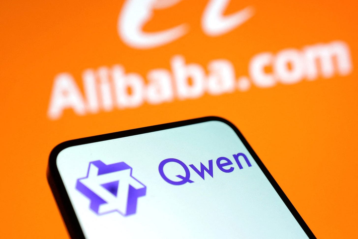 Illustration shows Qwen and Alibaba logos