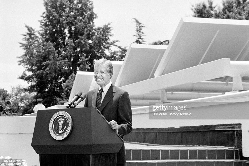 U.S. President Jimmy Carter speaking in front of Solar Panels placed on West Wing Roof of White House, announcing his solar energy policy, Washington, DC, USA, Warren K. Leffler, June 20, 1979