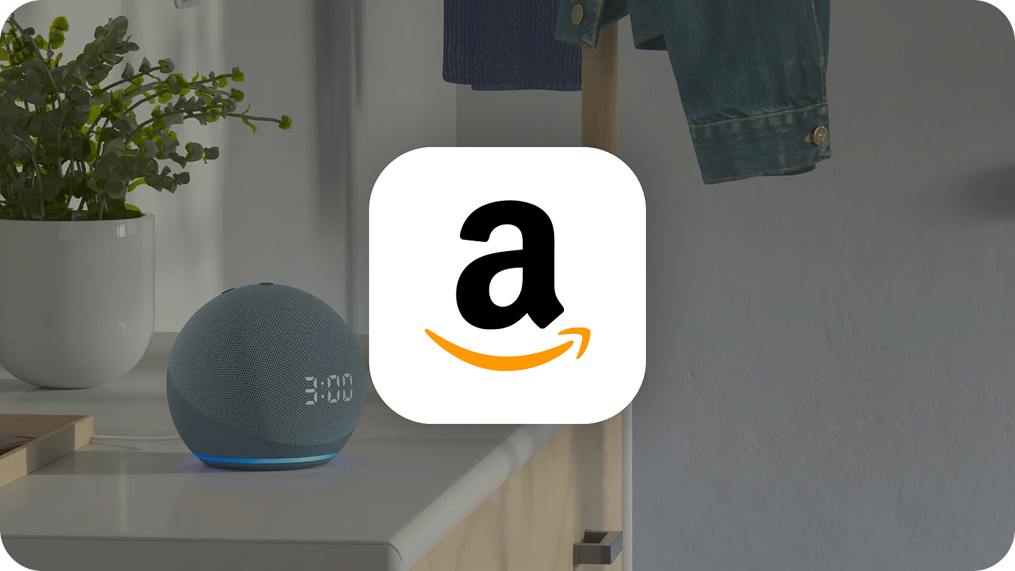Amazon logo with their new Echo device in a bedroom.