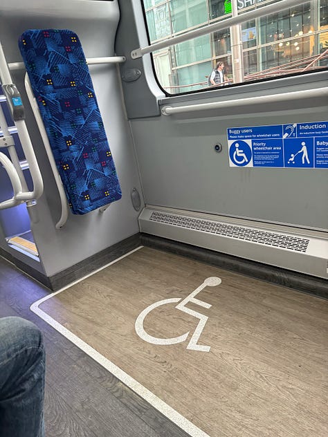 Photo 1: Wheelchair space with back rest Photo 2: USB socket in the wheelchair space Photo 3: Second USB socket