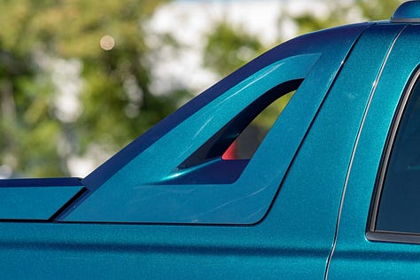 Cadillac Escalade EXT | Photo: Bring a Trailer