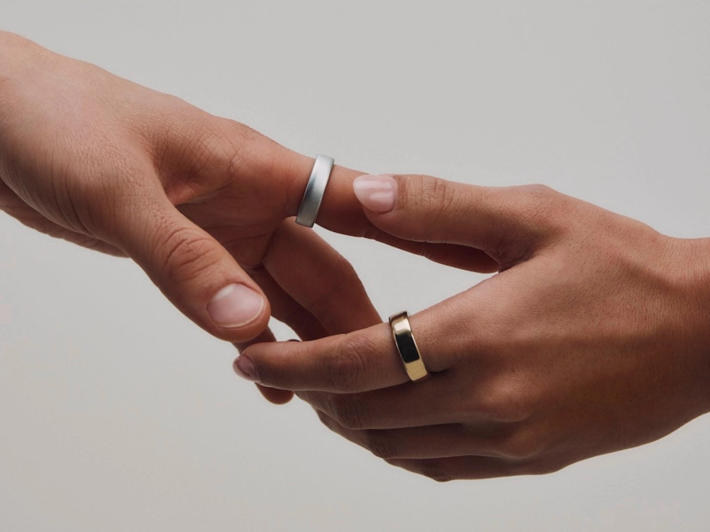 The Oura Ring 5 displayed against a minimalist background, highlighting its refined design and next-generation health monitoring features. The Oura Ring 5 displayed against a minimalist background, highlighting its refined design and next-generation health monitoring features.