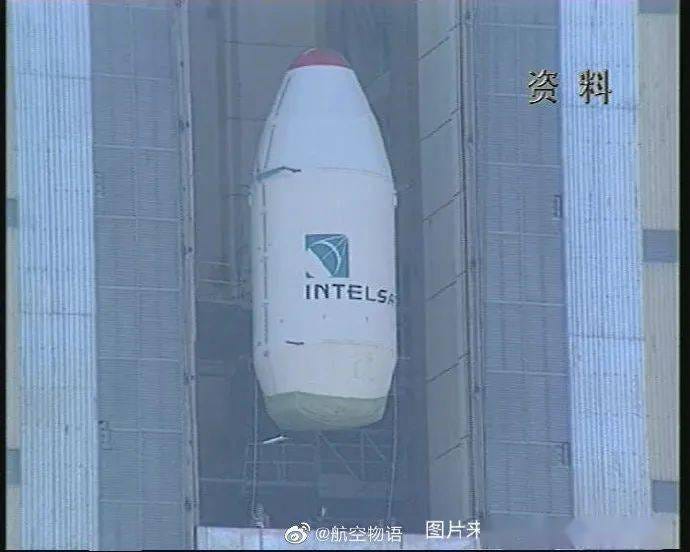 The Long March 3B Y1’s fairing, with Intelsat-708 inside, being lifted atop of the rocket during launch preparations. The Long March 3B Y1’s fairing, with Intelsat-708 inside, being lifted atop of the rocket during launch preparations.