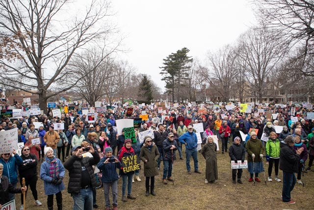 May be an image of crowd and text