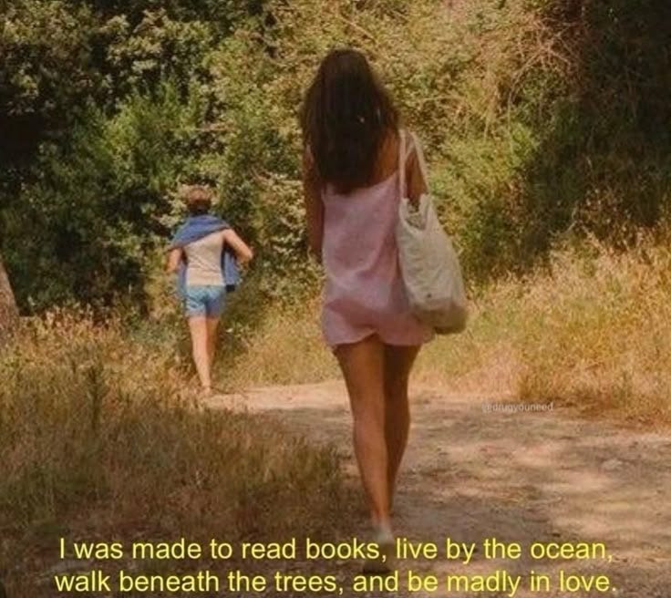 This may contain: two girls walking down a dirt road with trees in the background and a quote about reading books