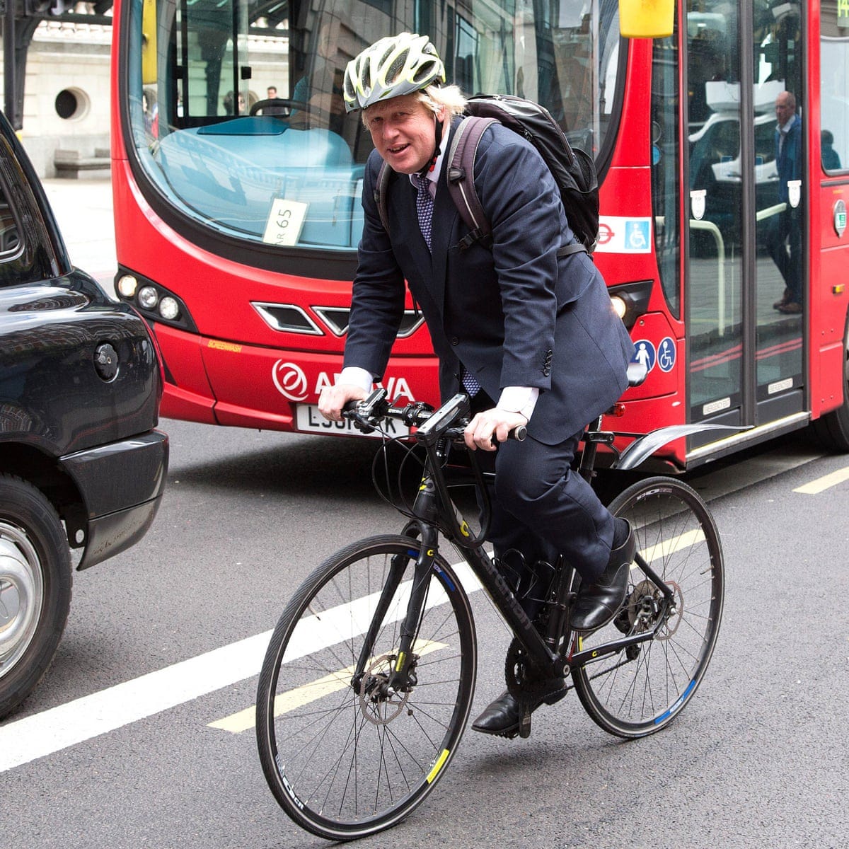 Back on his bike: Boris Johnson receives a motorcycle for Christmas | Boris  Johnson | The Guardian