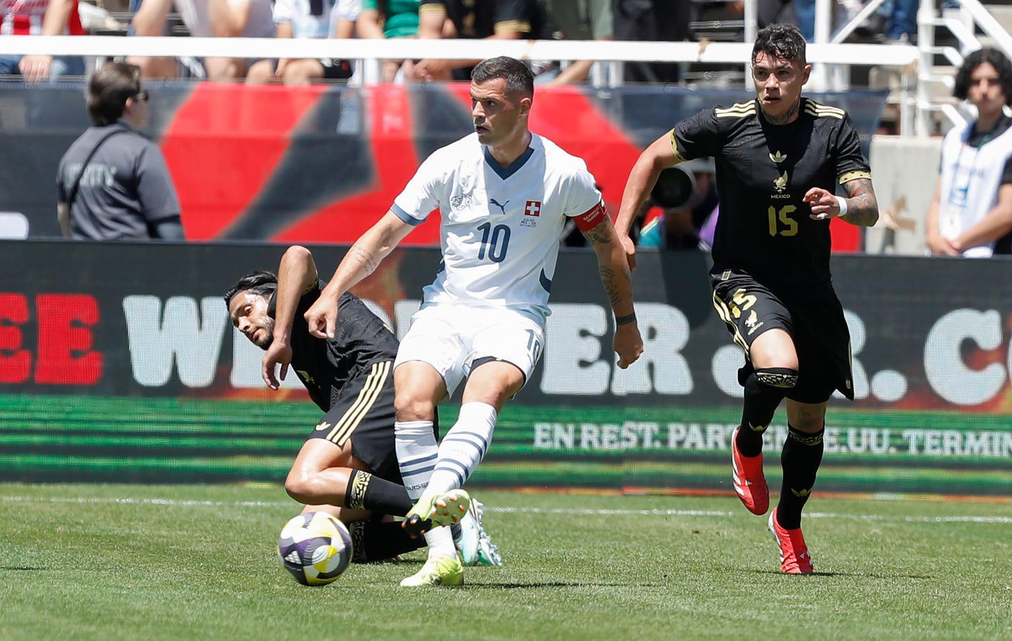 Granit Xhaka plays a pass during a friendly with Switzerland.