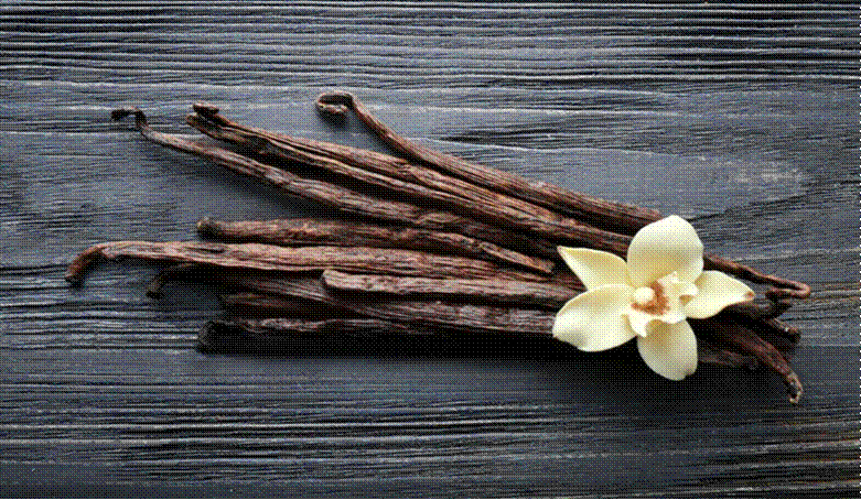 Title: A group of vanilla sticks with a flower on topAI-generated content may be incorrect.