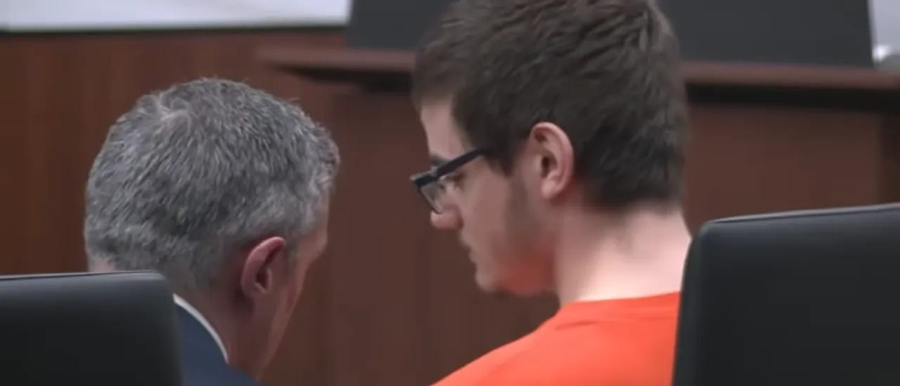 Nikita Casap's attorney speaks to him after they learn of his life sentences without the possibility of parole in Waukesha County court in Wisconsin on March 5, 2026.