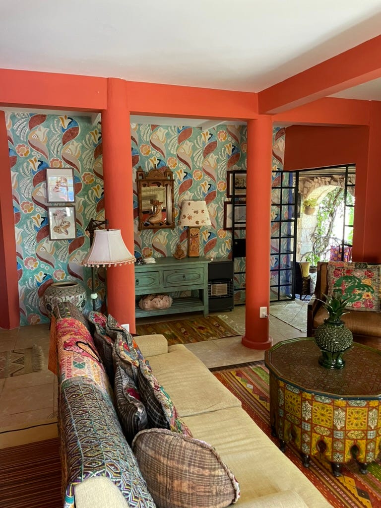 The interior of the living room of our house's rental unit, with Penny and Victor's belongings.
