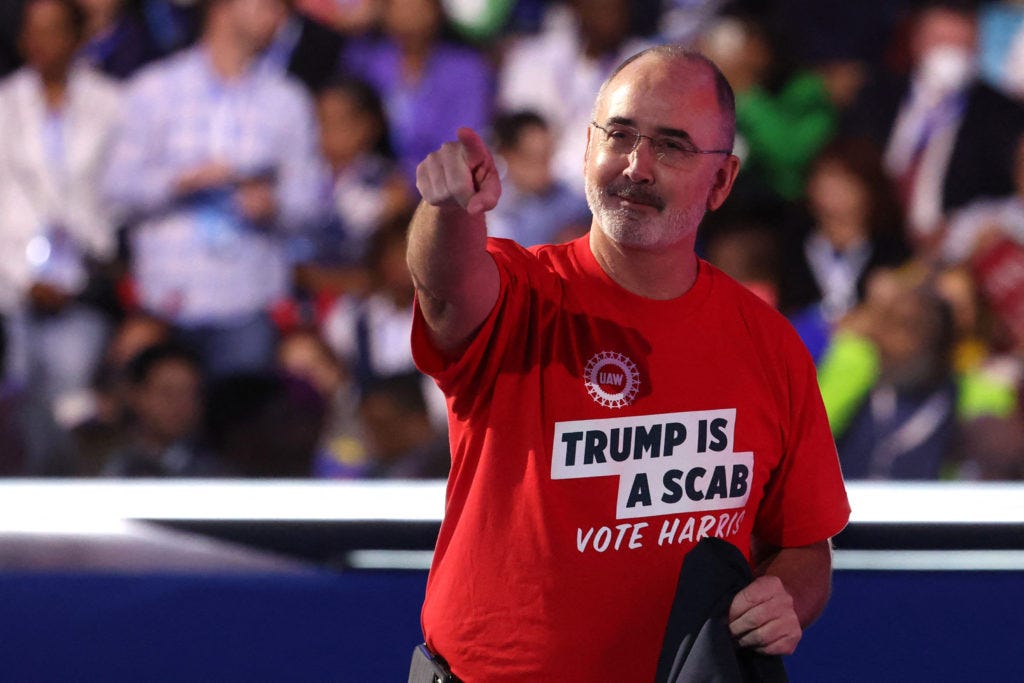 WATCH: UAW's Shawn Fain speaks at the Democratic National Convention,  revealing 'Trump is a scab' T-shirt | PBS News