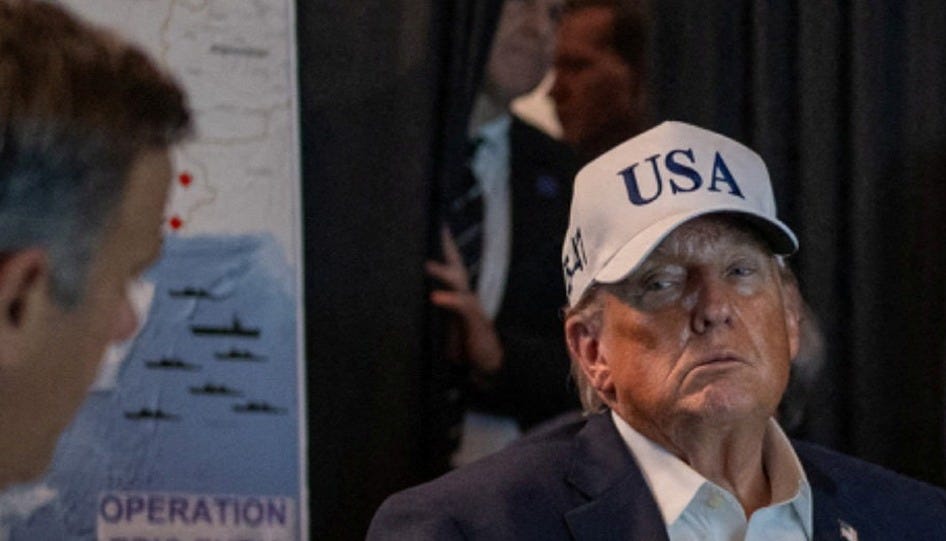 Donald Trump in a white USA baseball cap at the situation room at Mar-a-Largo. Donald Trump in a white USA baseball cap at the situation room at Mar-a-Largo.