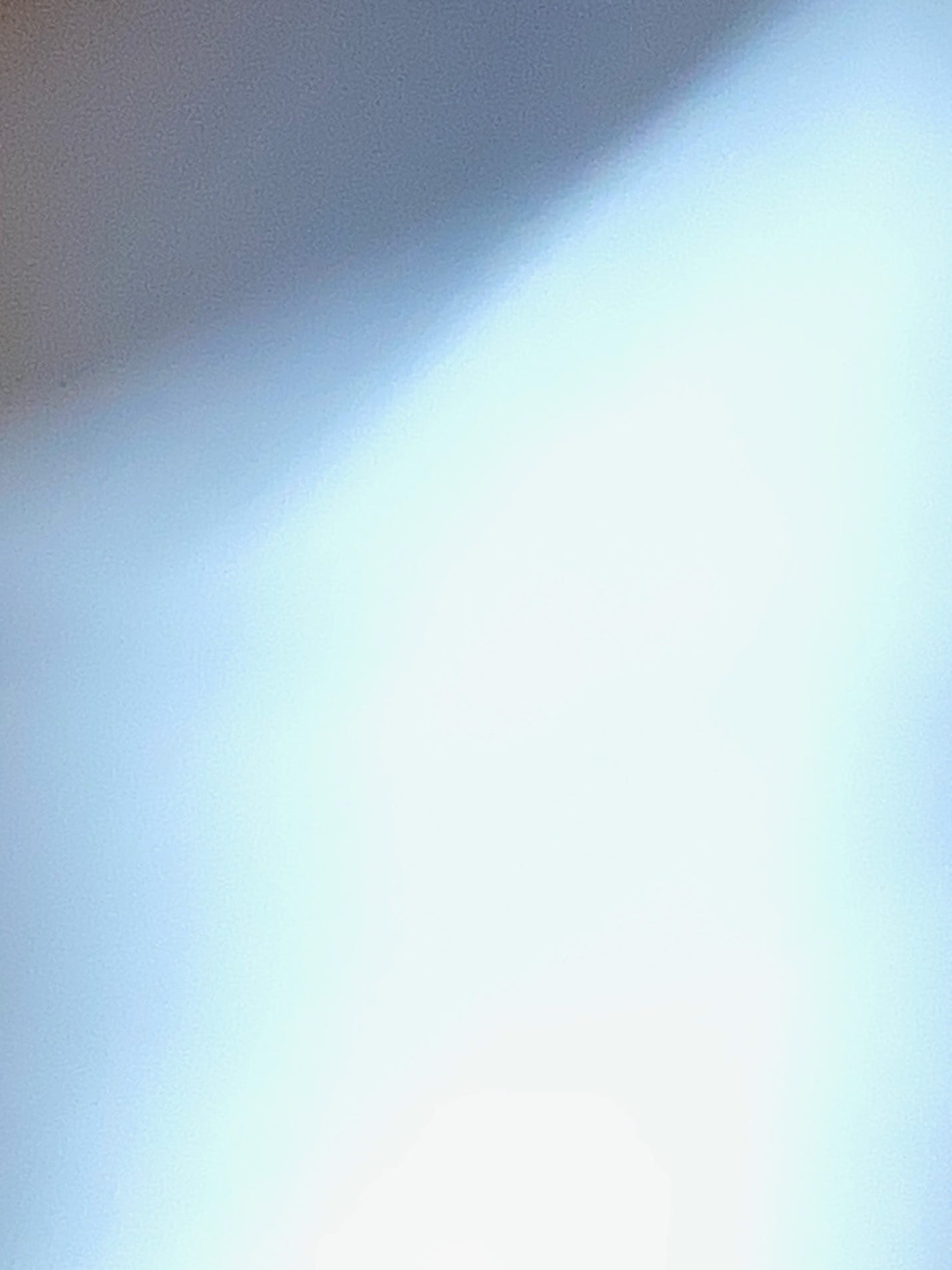 A light shining on a white surface

AI-generated content may be incorrect.