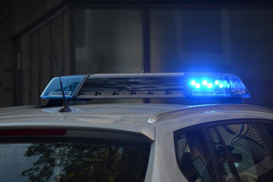 vehicle blue emergency light turned on, third career vehicle blue emergency light turned on, third career