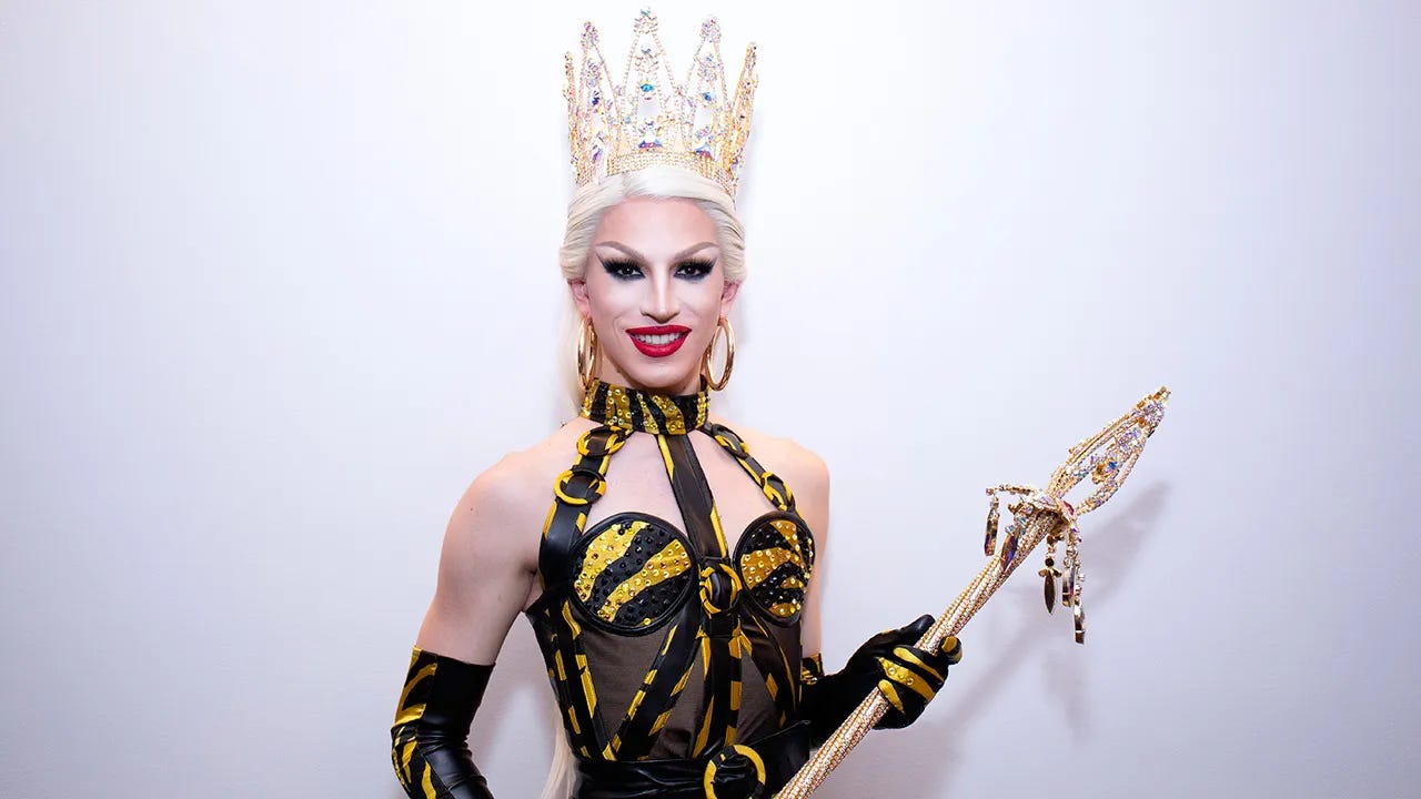 Aquaria with her prize crown and sceptre