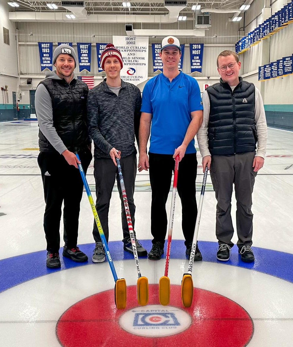 May be an image of 4 people, people skating, people playing hockey and text