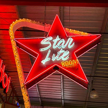 a host of signs from the Valley Relics Museum