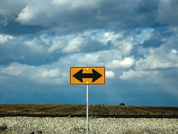 road sign split sign road fork-in-the-road stock pictures, royalty-free photos & images road sign split sign road fork-in-the-road stock pictures, royalty-free photos & images
