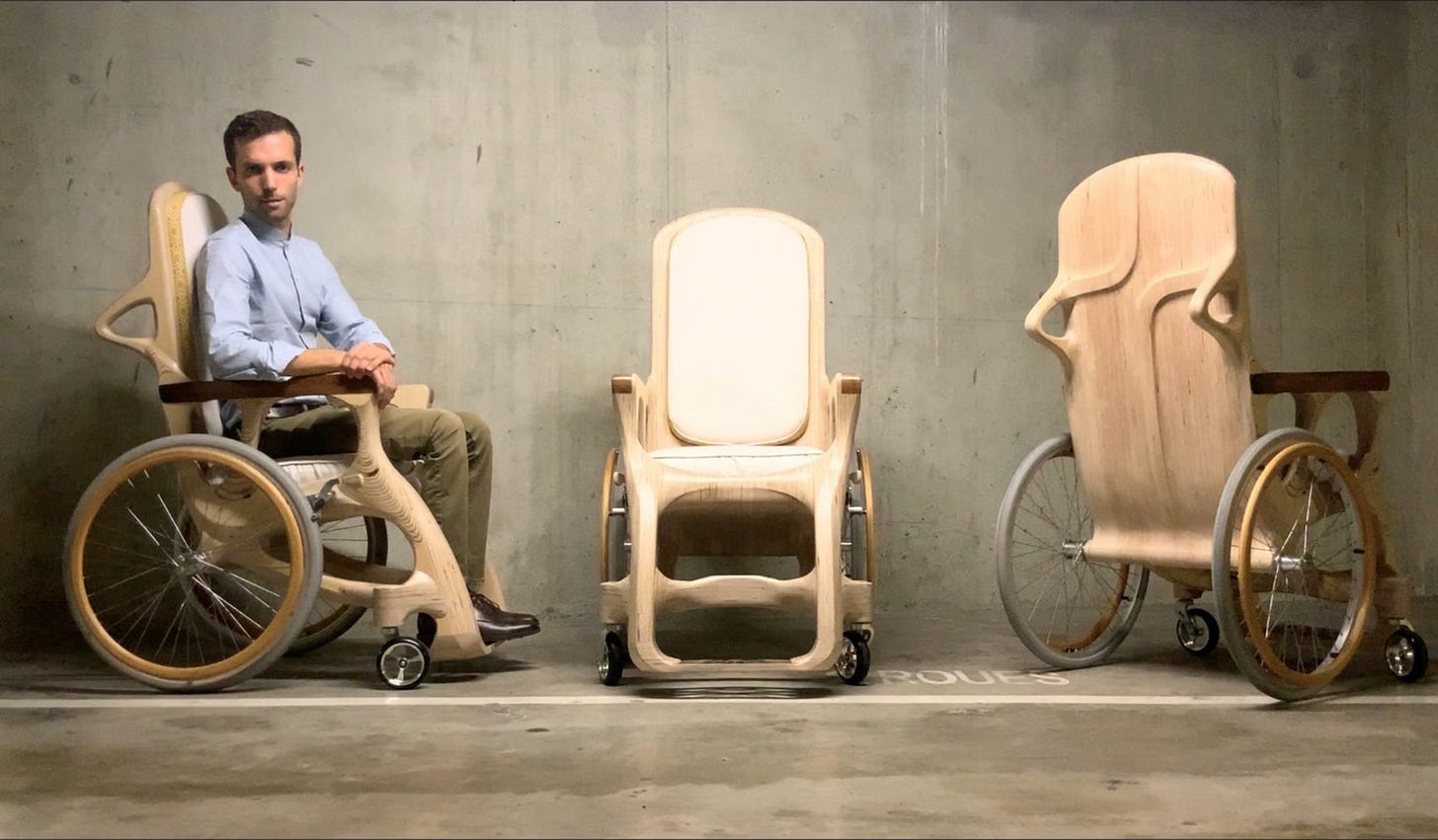 A white disabled designer sits in a wooden wheelchair, with images of the chair from 3 angles.