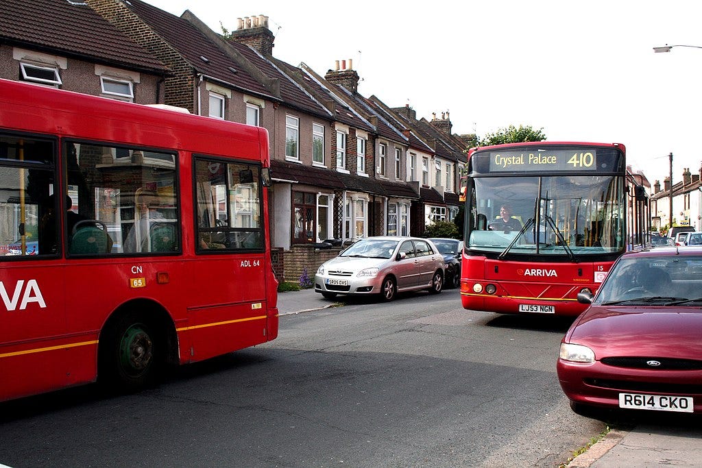 Two red London buses in Croydon