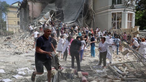 No words for this': horror over Russian bombing of Kyiv children's hospital  | Ukraine | The Guardian