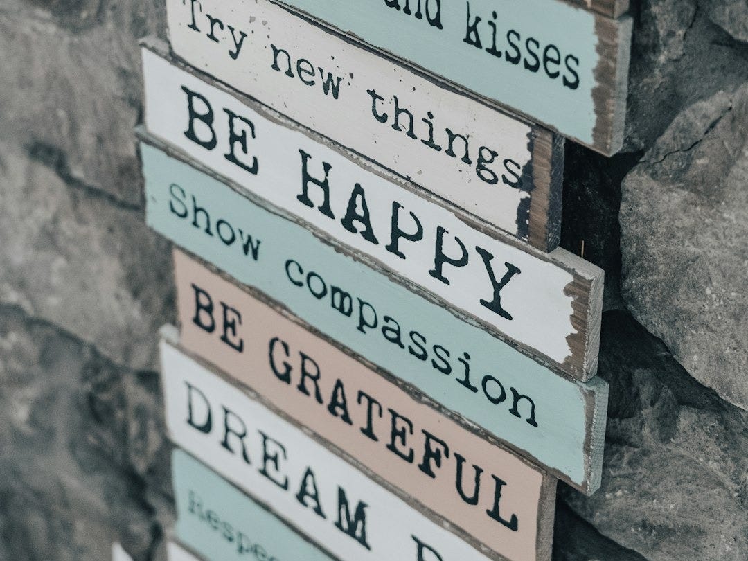 white and brown wooden signage