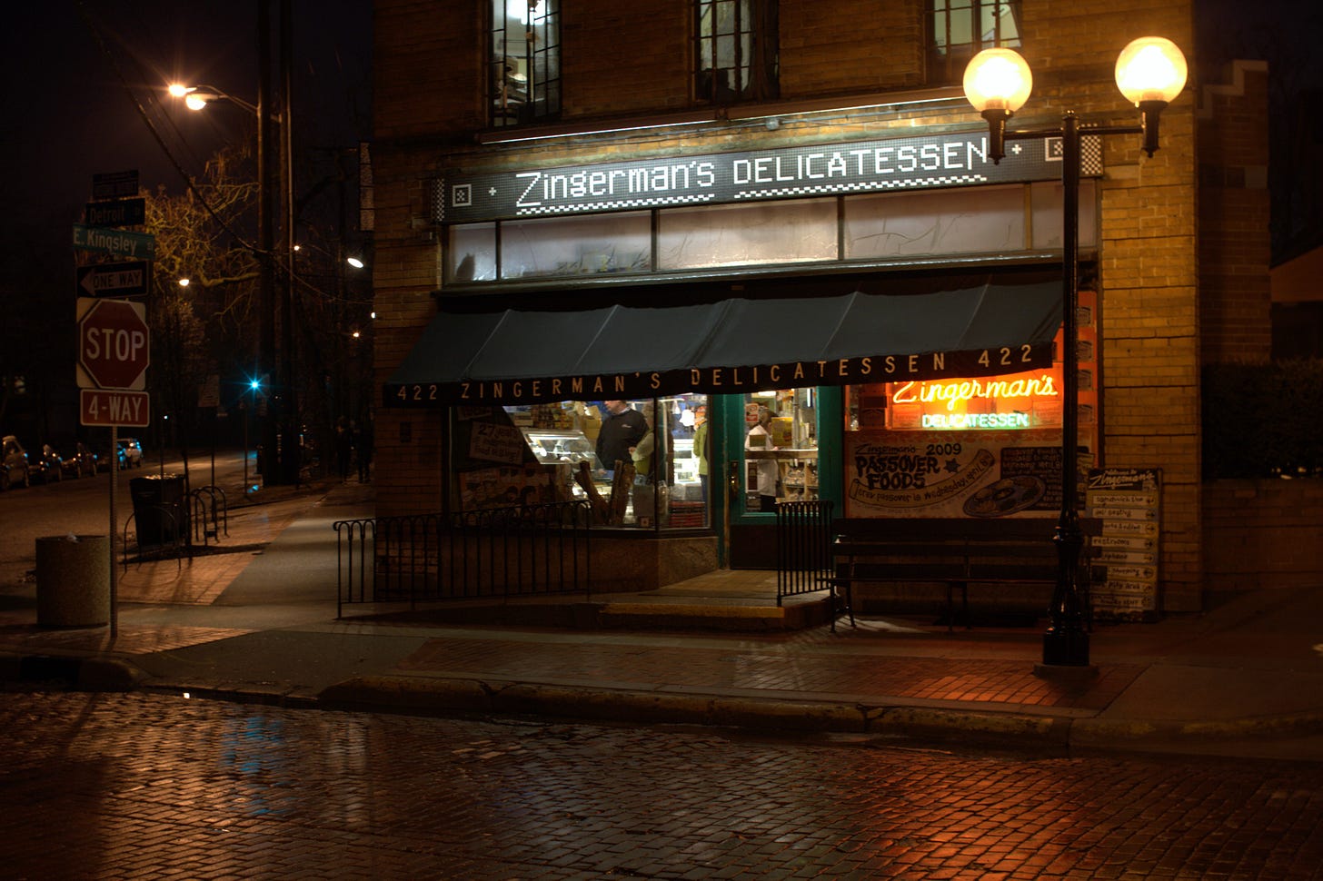 A photo of the Zingerman's Deli storefront at night in March 2009