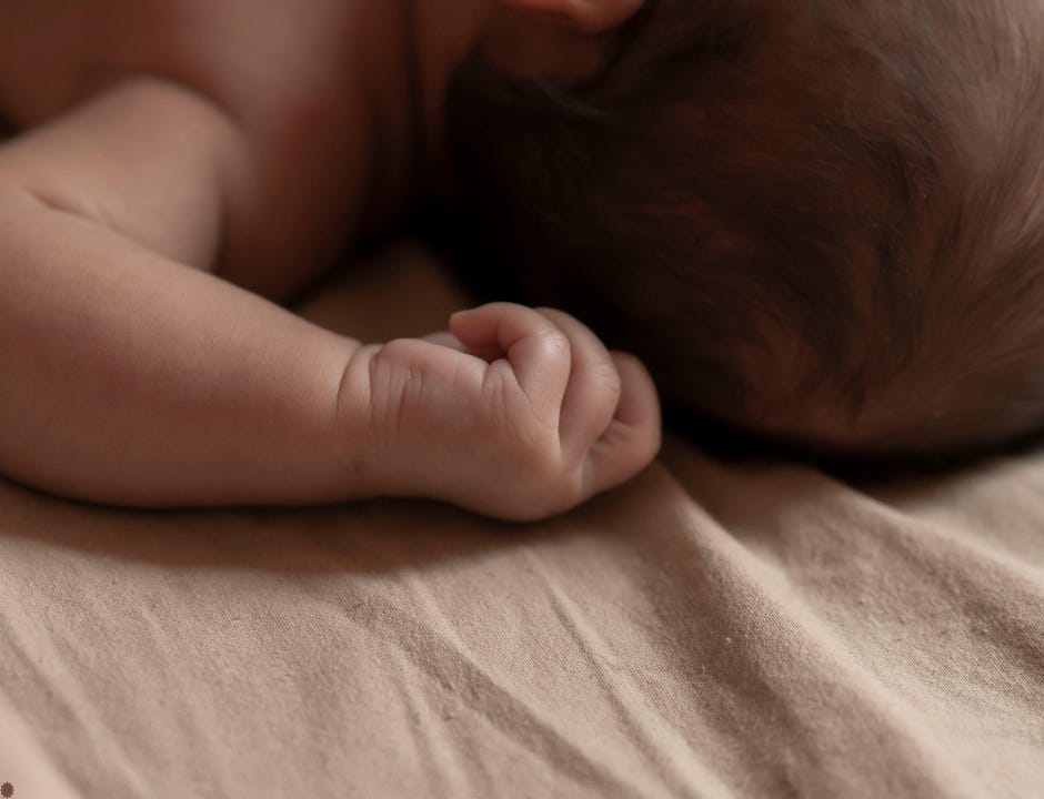 arm and hand of baby