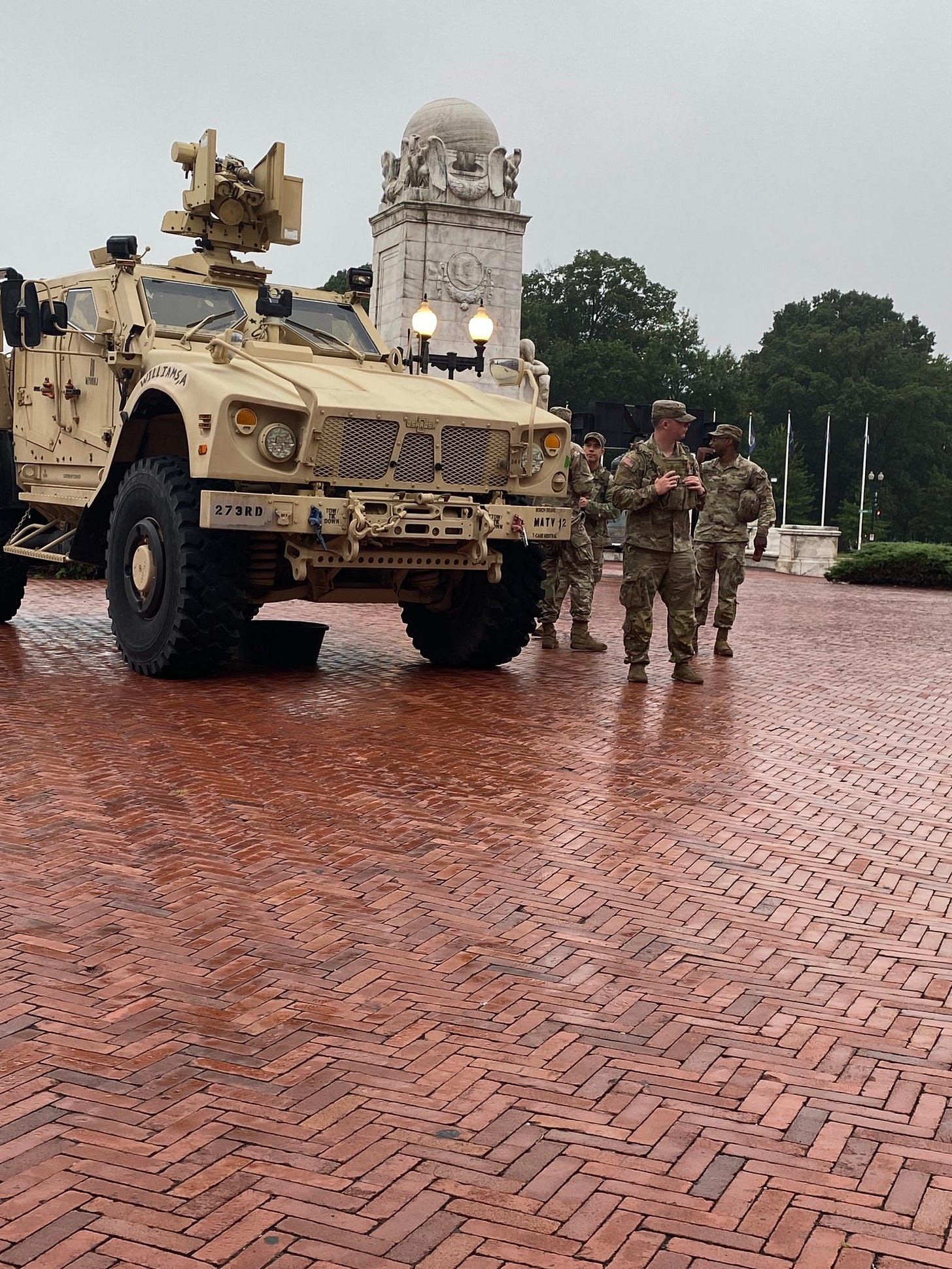 A group of soldiers standing next to a military vehicle

AI-generated content may be incorrect.